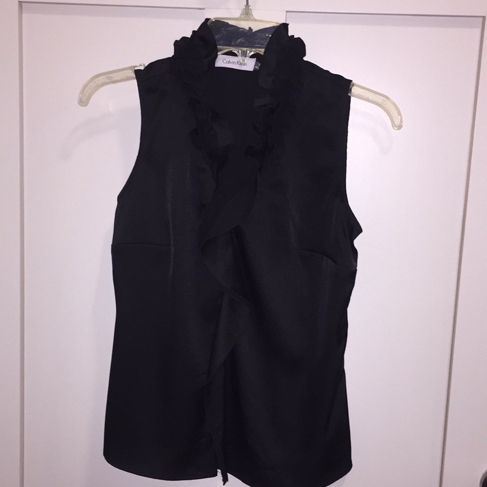 Women’s NWT petite black blouse.